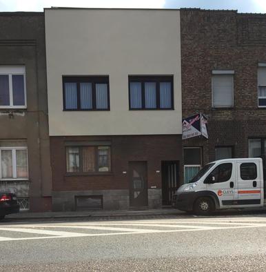 Geschiedenis Première façade en crépi