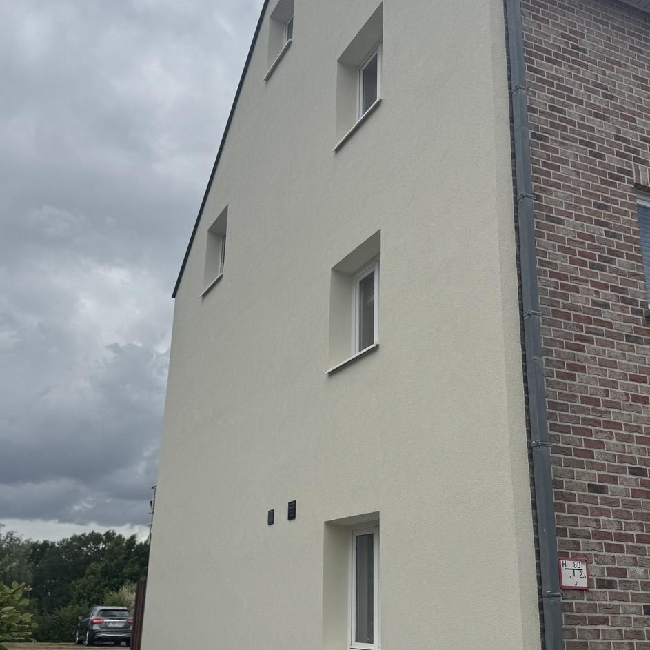 Façade après rénovation - Rénovation subtile!