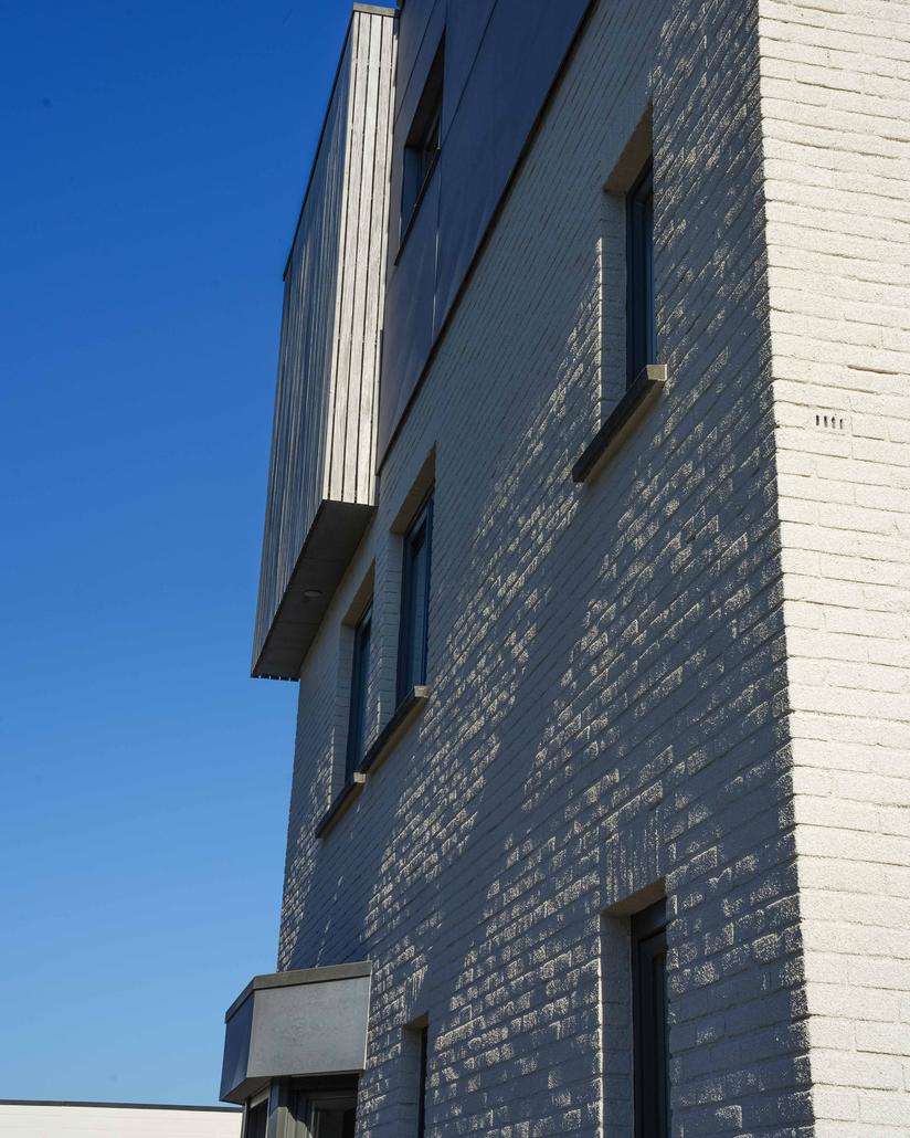 Spuitkurk gevelrenovatie in Sinaai