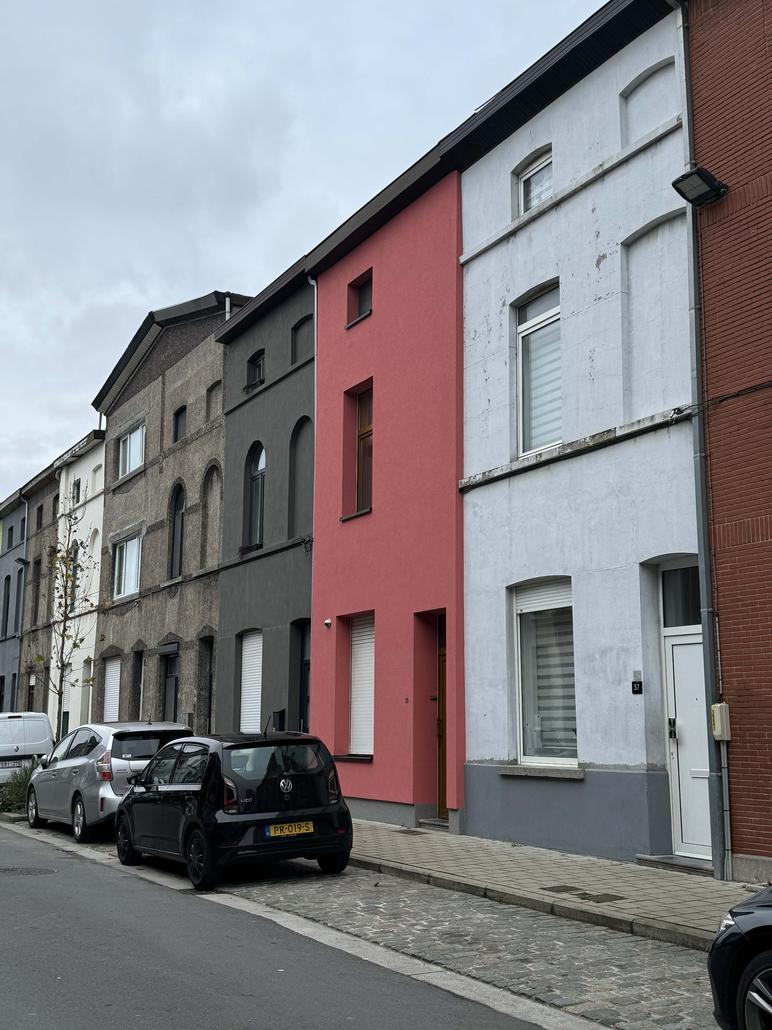 Isolation de façade et crepi rose à Gand