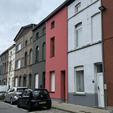 Isolation de façade et crepi rose à Gand