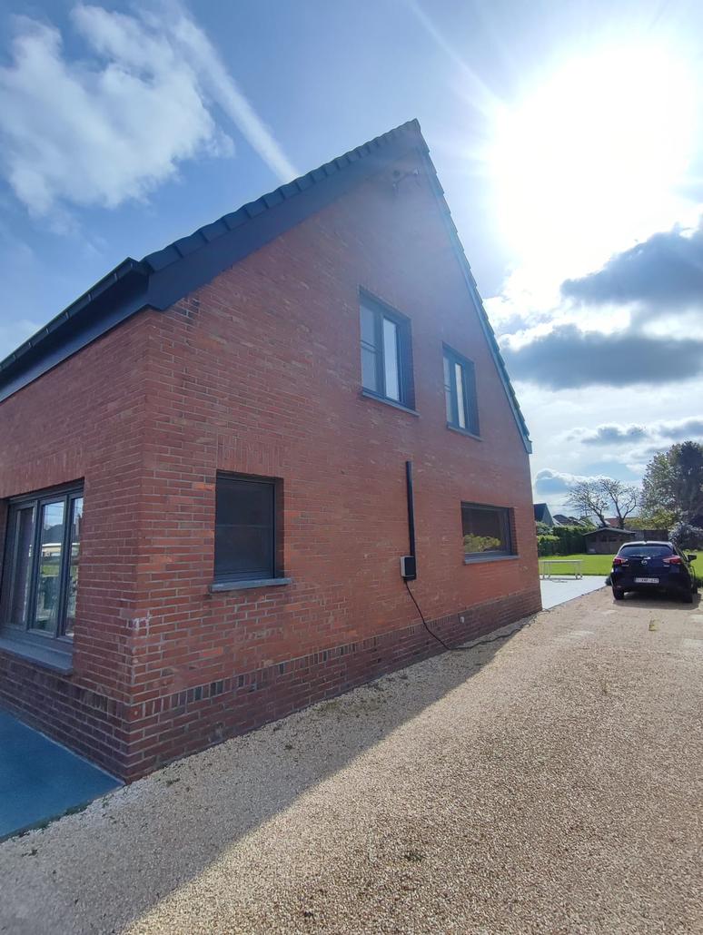 Liège projeté sur brique à Aalter