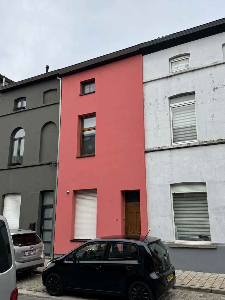 Isolation de façade et crepi rose à Gand