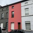 Isolation de façade et crepi rose à Gand