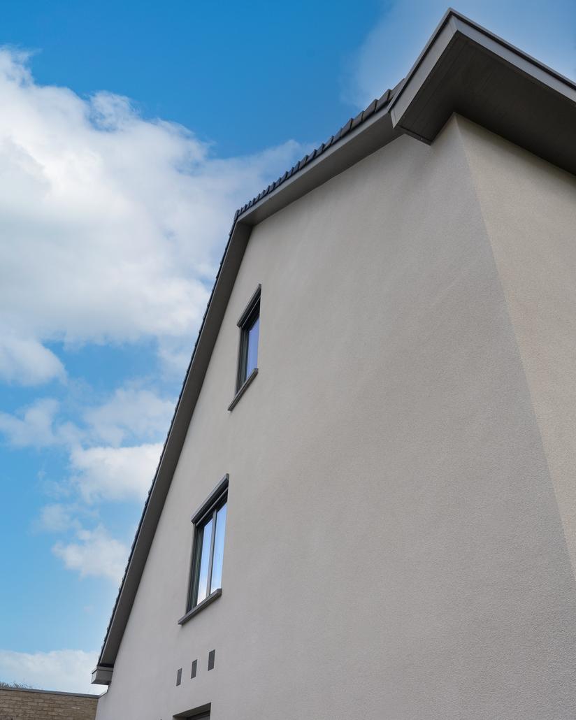 Gevelrenovatie met spuitkurk in Sint-Gillis