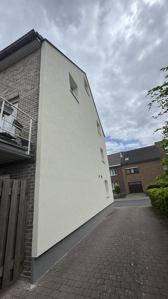 Façade en crepi gris à Zaventem