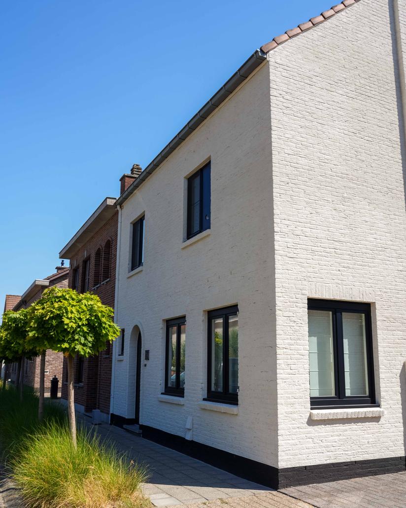 Spuitkurk gevelrenovatie in Temse