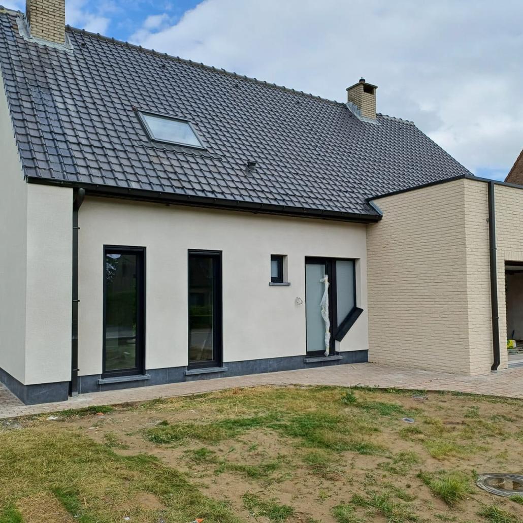 Isolation de façade liège projeté et briquettes de parement Merchtem