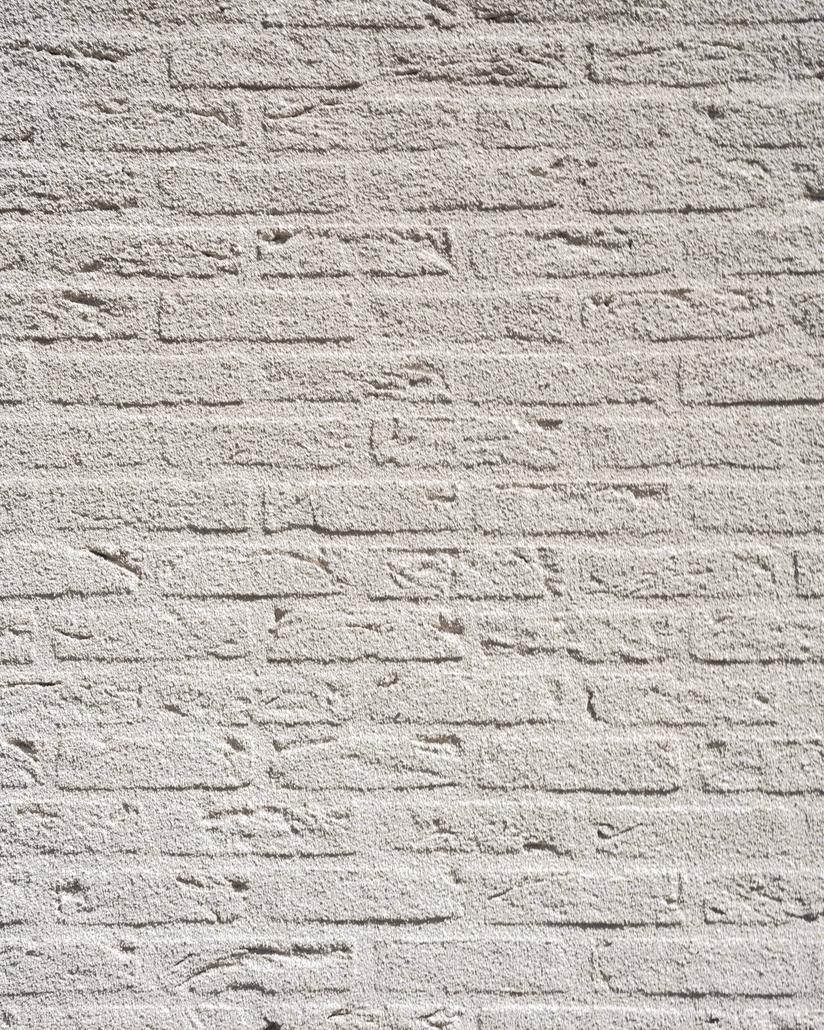Spuitkurk gevelrenovatie in Temse