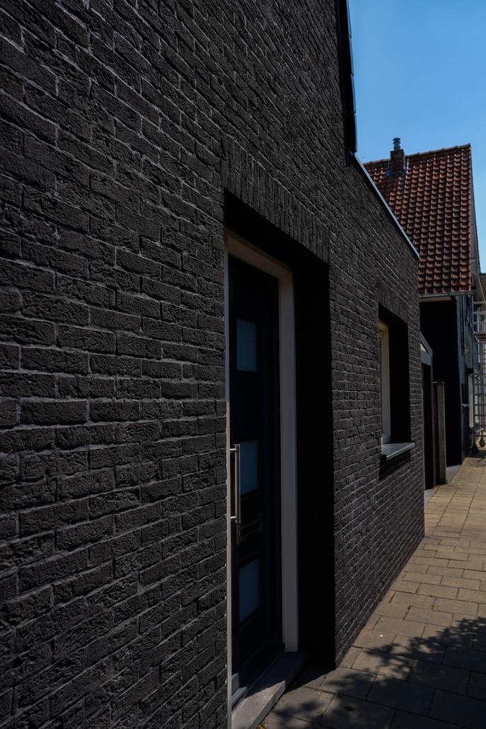 Steenstrips en isolatie gevel Hulst