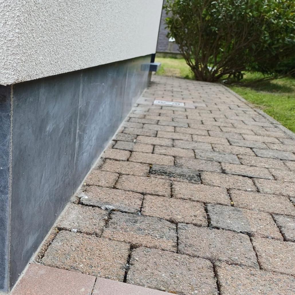 Isolation de façade liège projeté et briquettes de parement Merchtem