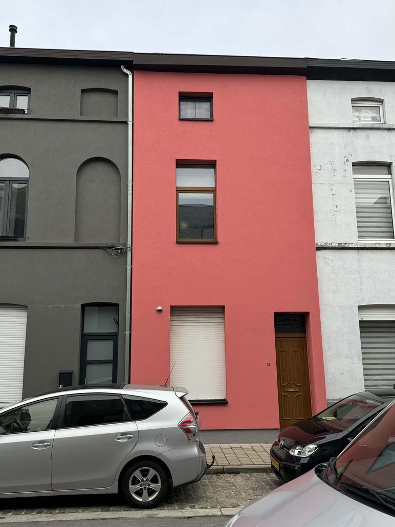 Isolation de façade et crepi rose à Gand
