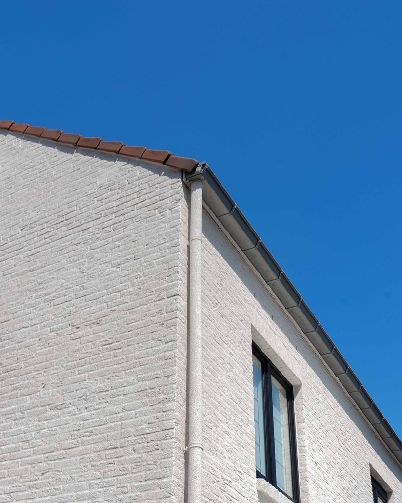 Spuitkurk gevelrenovatie in Temse