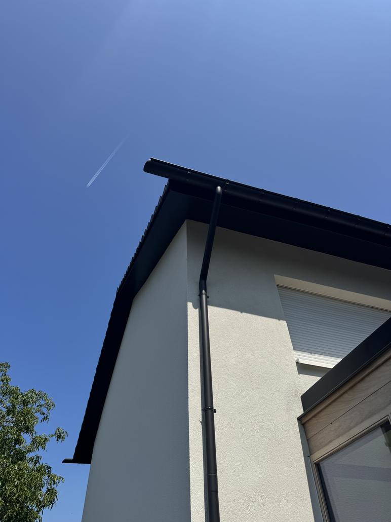 Façade en crepi gris à Zaventem