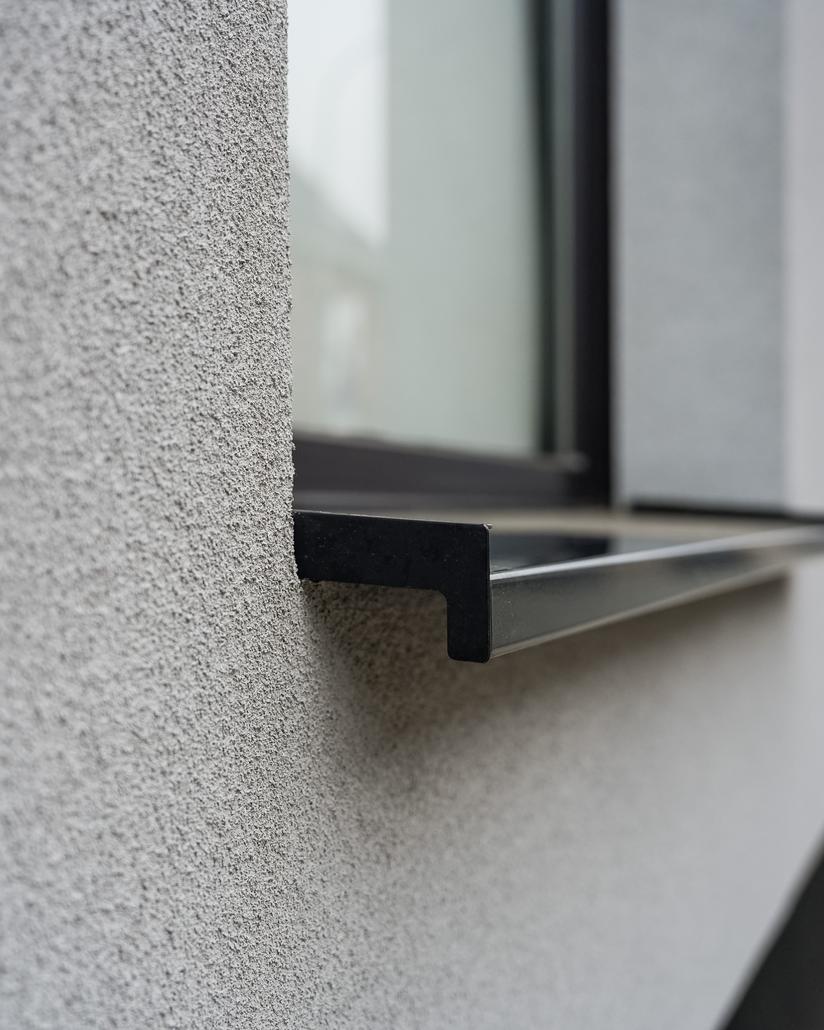 Gevelrenovatie met spuitkurk in Berlare