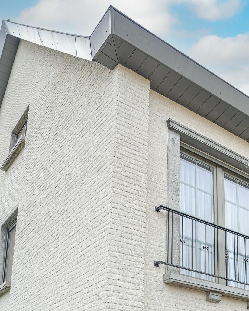 Renovation de facade avec liege projete a Eeklo