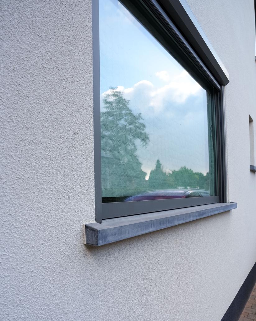 Gevelrenovatie met spuitkurk in Sint-Gillis