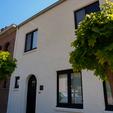 Spuitkurk gevelrenovatie in Temse