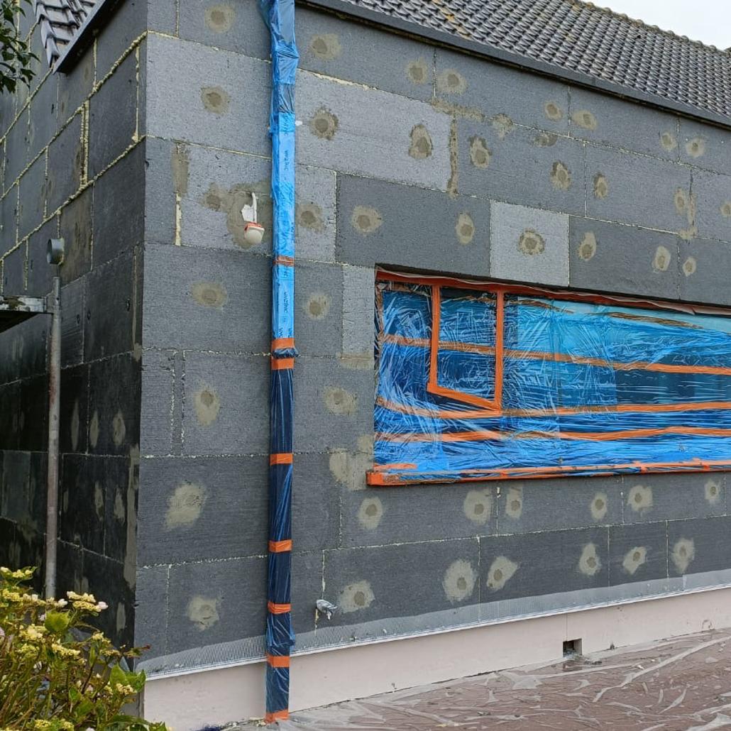 Isolation de façade liège projeté et briquettes de parement Merchtem