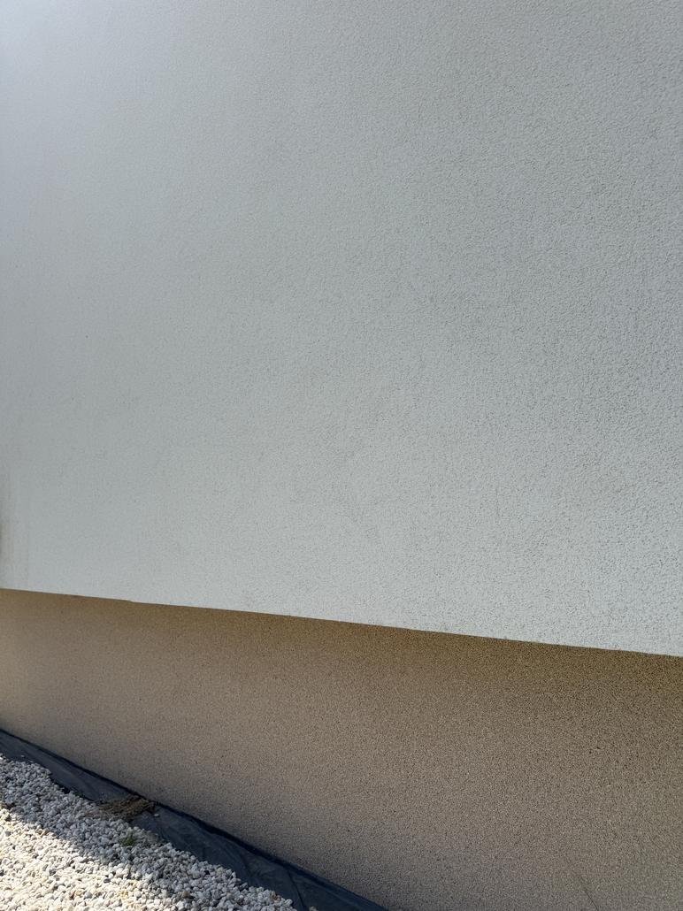 Façade en crepi gris à Zaventem