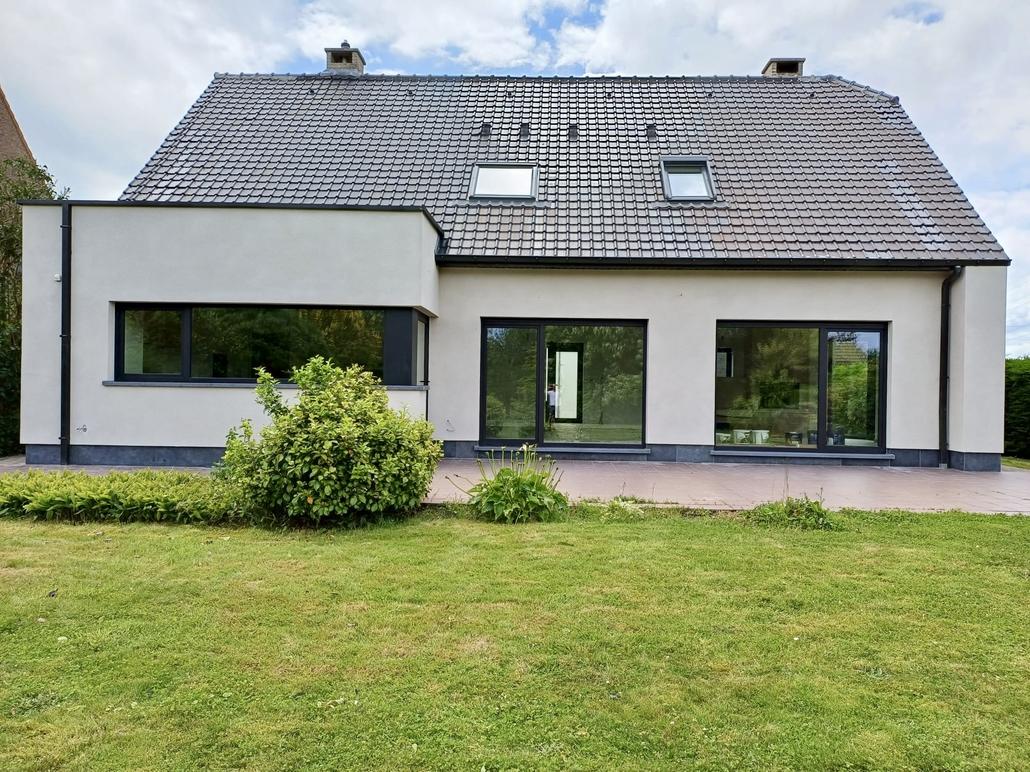 Isolation de façade liège projeté et briquettes de parement Merchtem