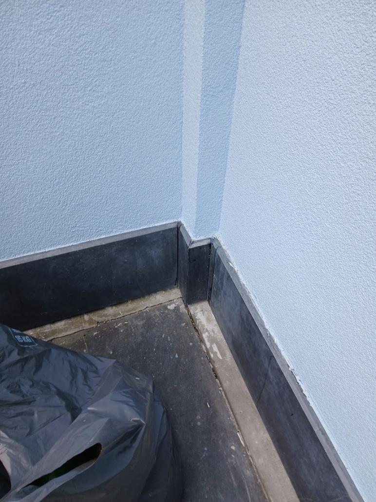 Façade arrière en crepi bleu à Hemiksem