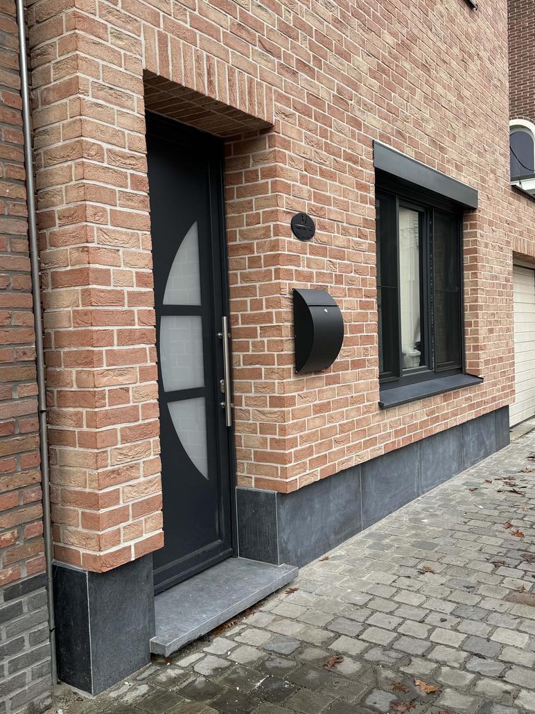 Gevelisolatie en steenstrips rumst