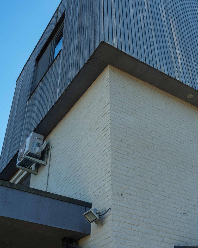 Spuitkurk gevelrenovatie in Sinaai