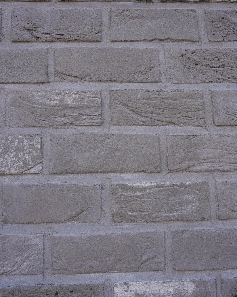 Gevel met isolatie en steenstrips Merksem