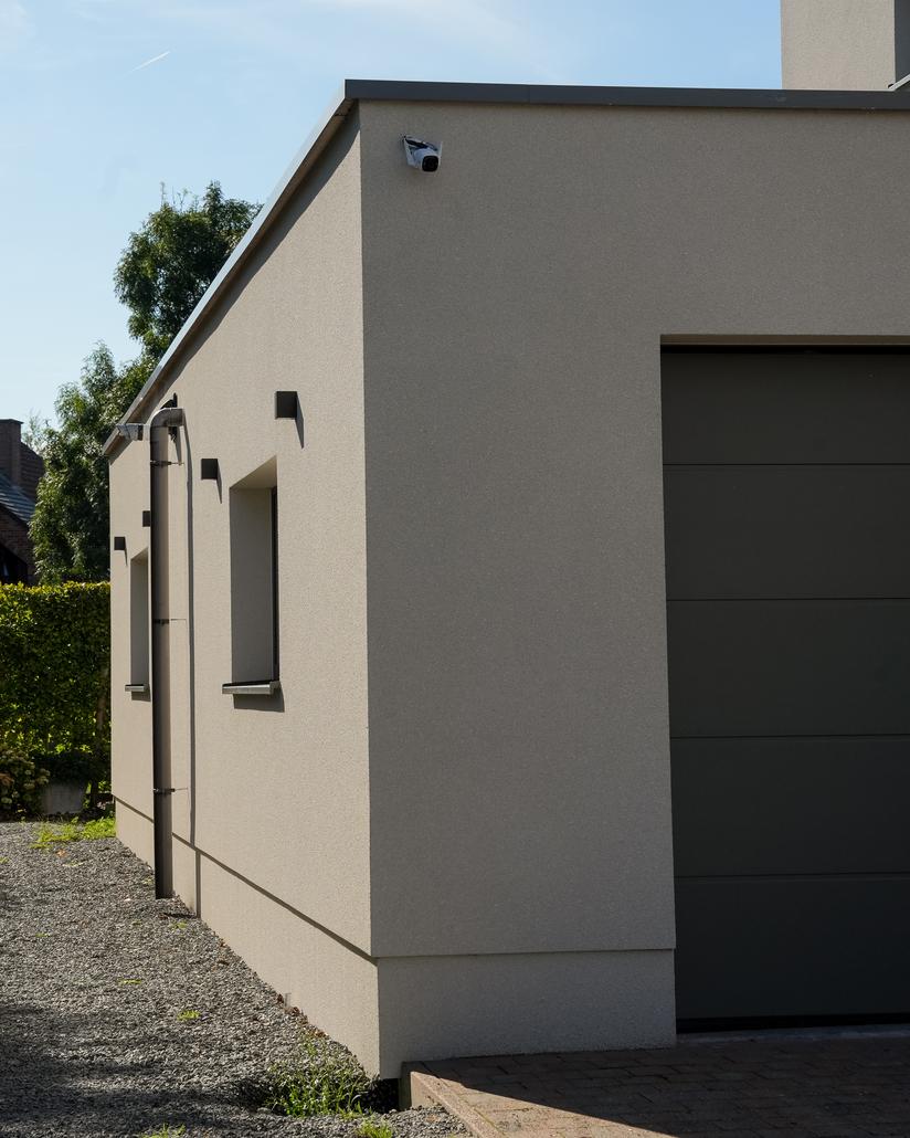 Spuitkurk en steenstrips gevel in Hofstade