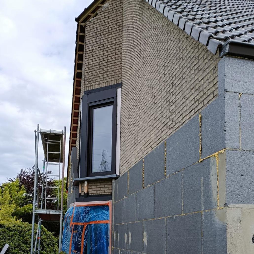 Isolation de façade liège projeté et briquettes de parement Merchtem