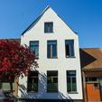 Gevelrenovatie met crepi in Oostkamp