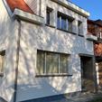Façade en crepi épurée pour une maison à Schilde