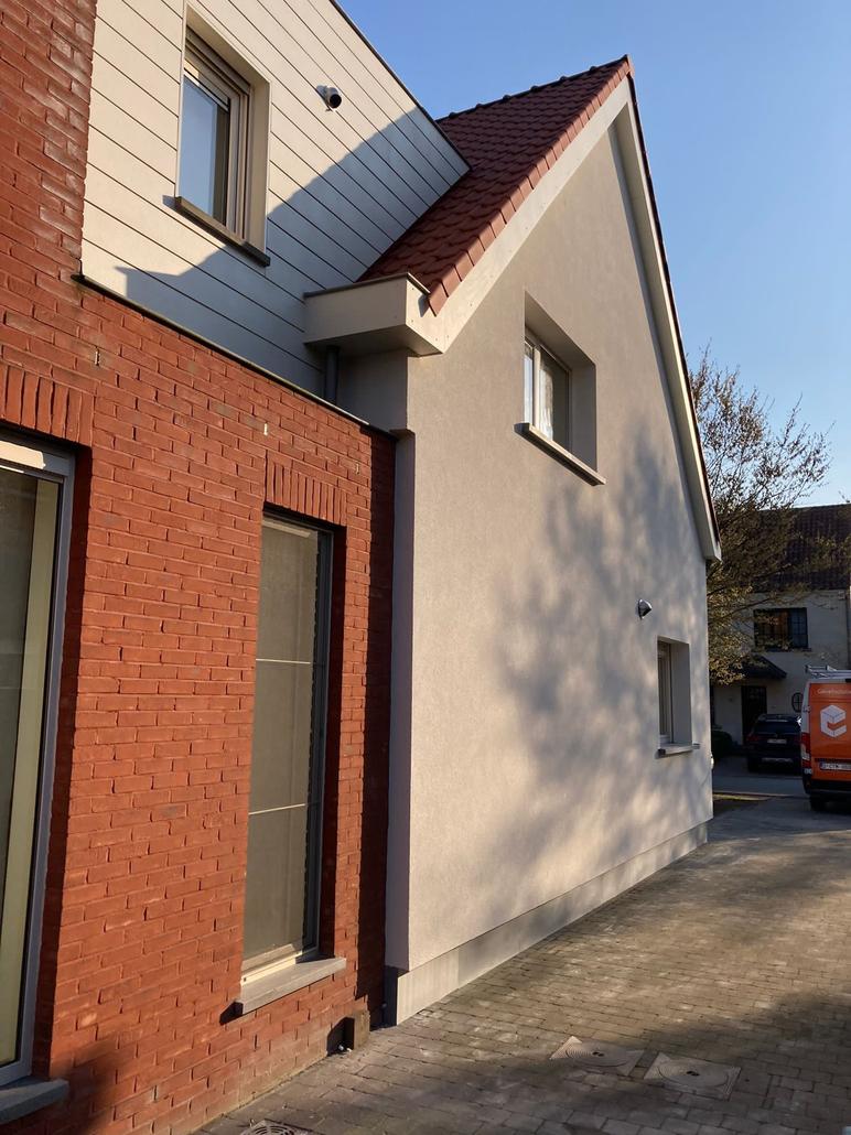Façade en crepi épurée pour une maison à Schilde