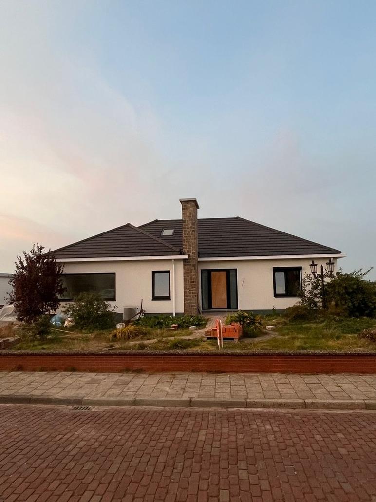 Cleys renove la facade avec crepi a Hulst