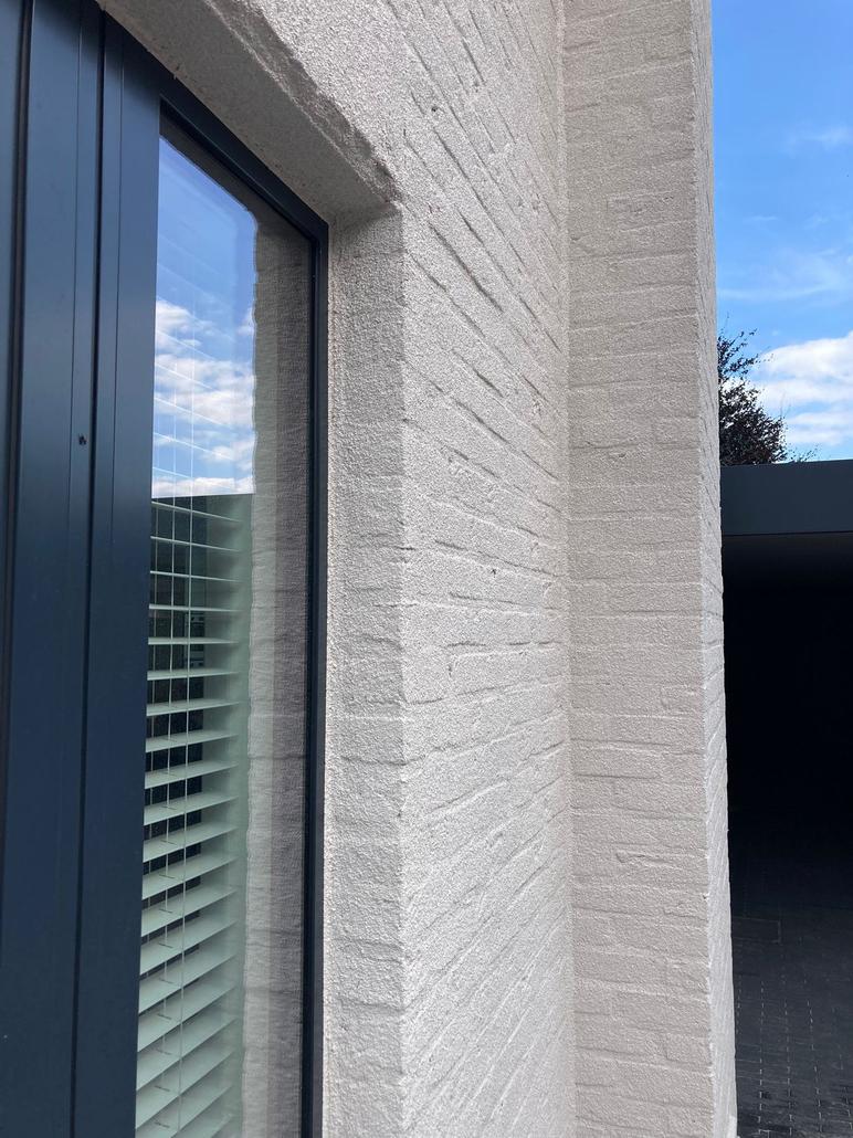 Spuitkurk op gevel in Sint-Niklaas