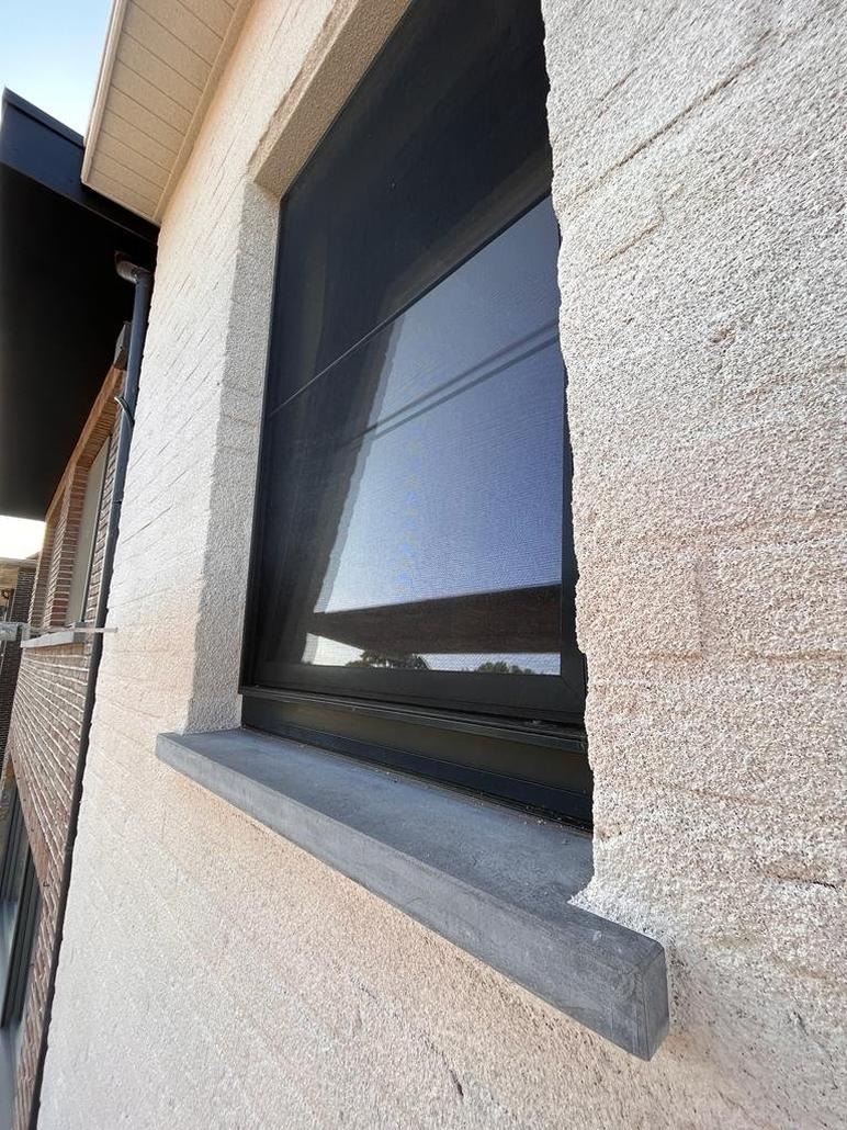 Spuitkurk op gevel in Sint-Niklaas