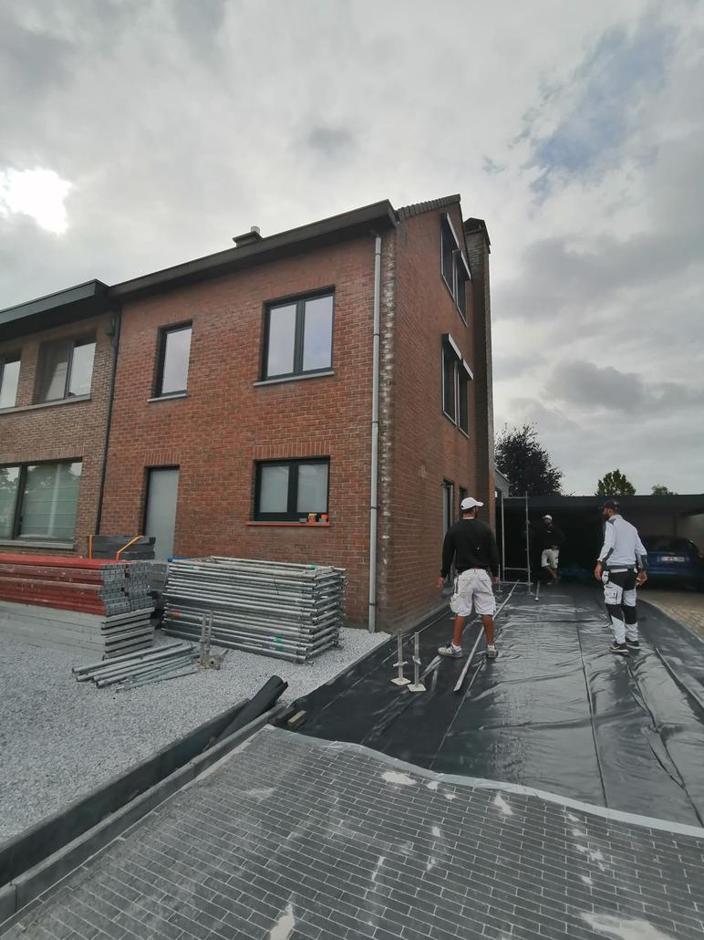 Spuitkurk op gevel in Sint-Niklaas