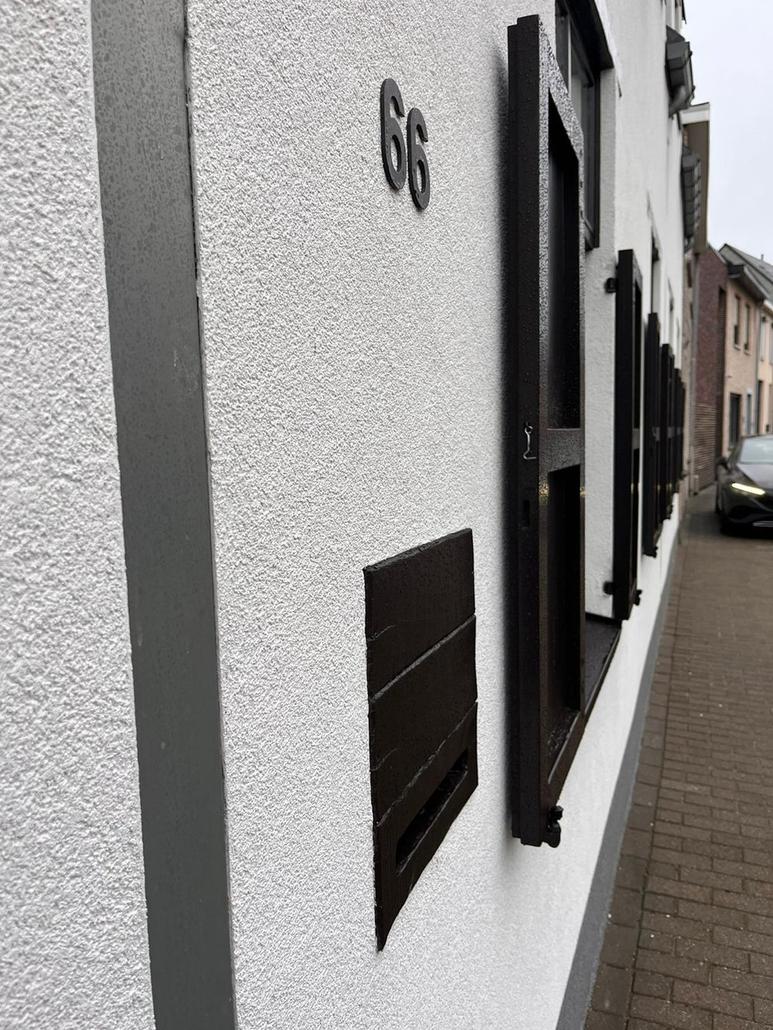 Renovation de facade avec caractere a Vrasene