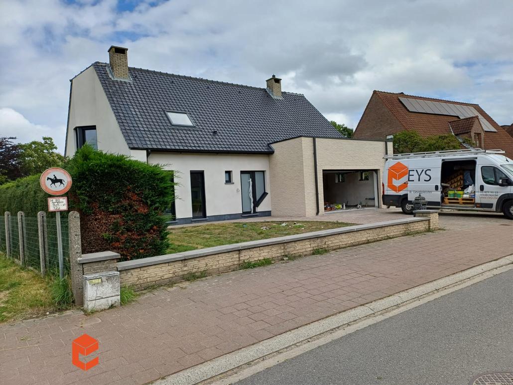 Isolation de façade liège projeté et briquettes de parement Merchtem