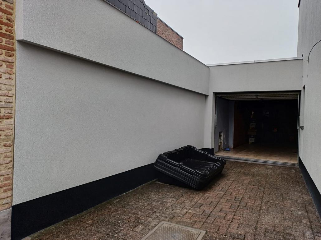 Strakke gevel met crepi in Hamme