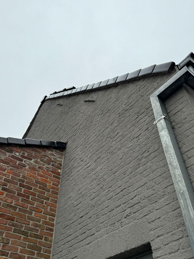Rénovation de façade à Moerbeke: liège projeté