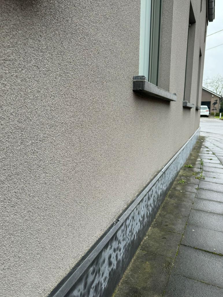 Rénovation de façade à Moerbeke: liège projeté