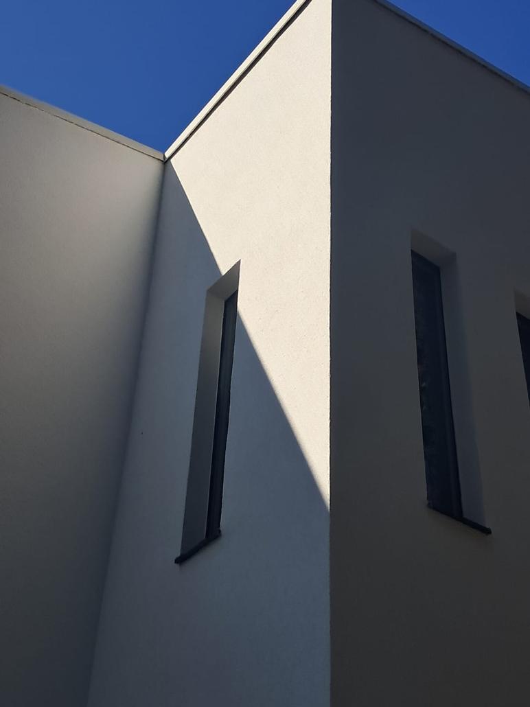 Façade blanche en crepi pour une maison à Poppel
