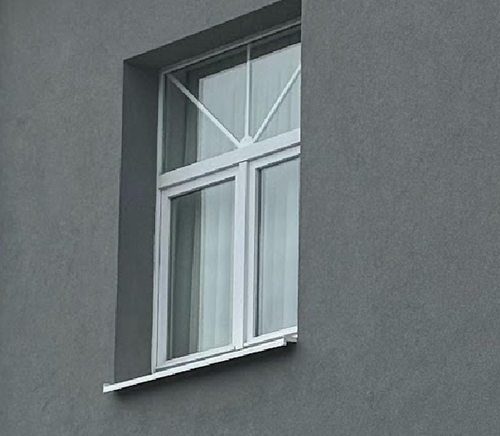 Isolation de façade et crepi gris à Melle