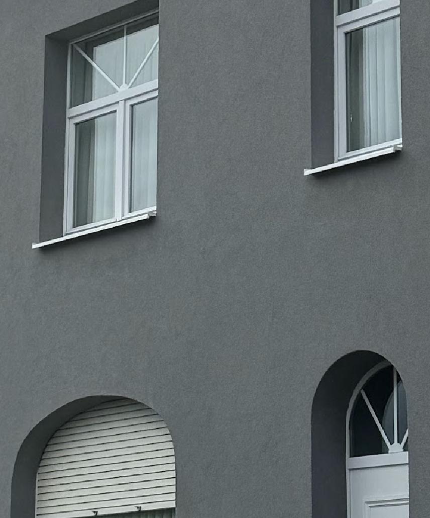 Isolation de façade et crepi gris à Melle