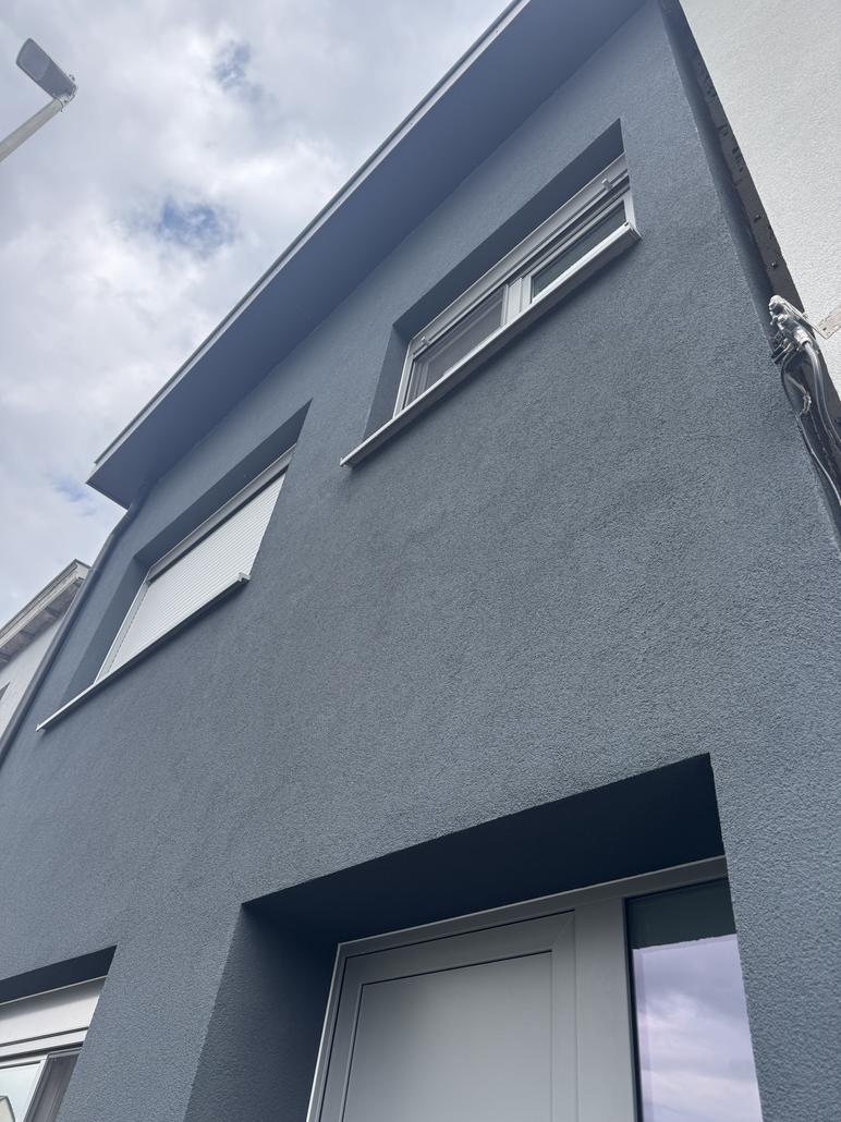 Crepi anthracite sur maison mitoyenne à Zwijndrecht