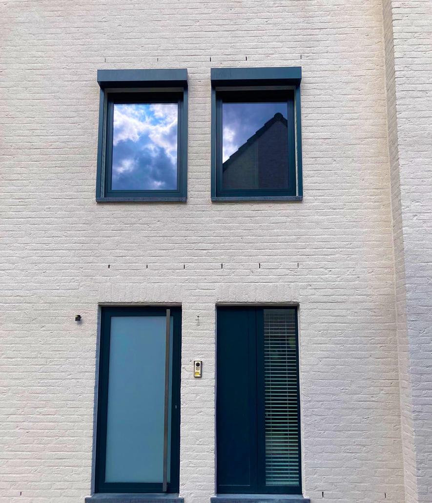 Spuitkurk op gevel in Sint-Niklaas