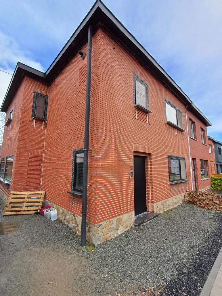 Façade en liège projeté à Merelbeke