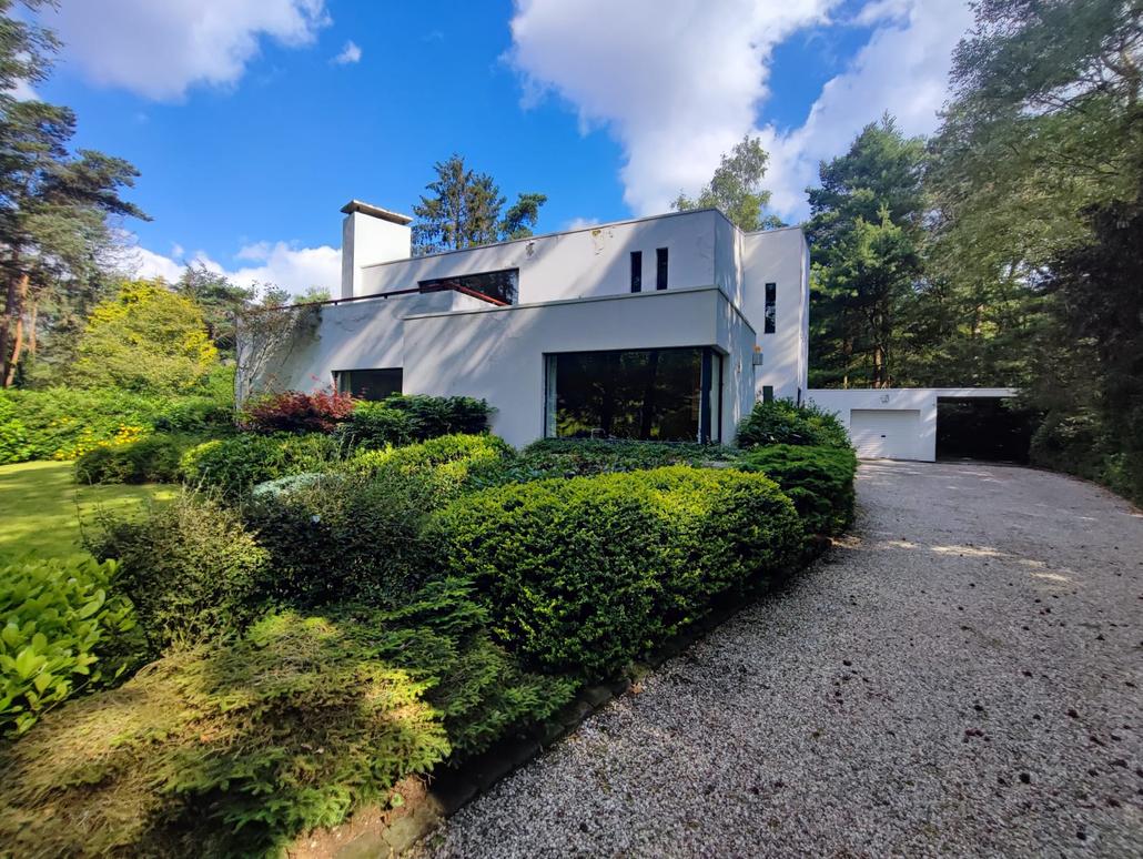 Façade blanche en crepi pour une maison à Poppel